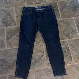 Dark wash skinny jeans with fun zipper at ankle